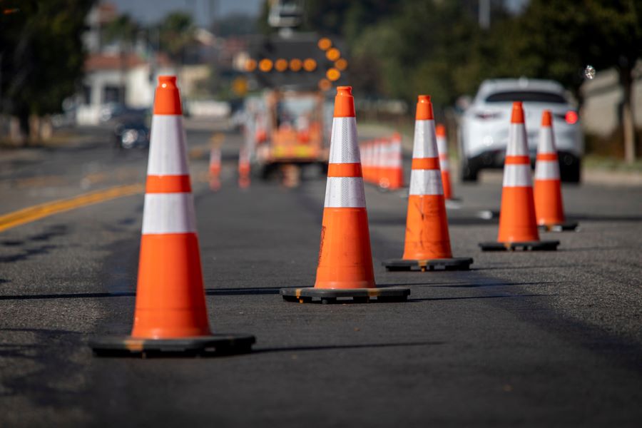 traffic cones blocking an ongoing road repair