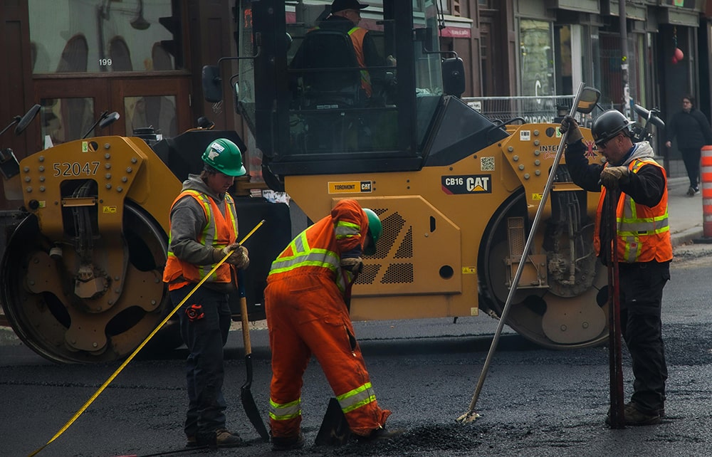 men working on the road