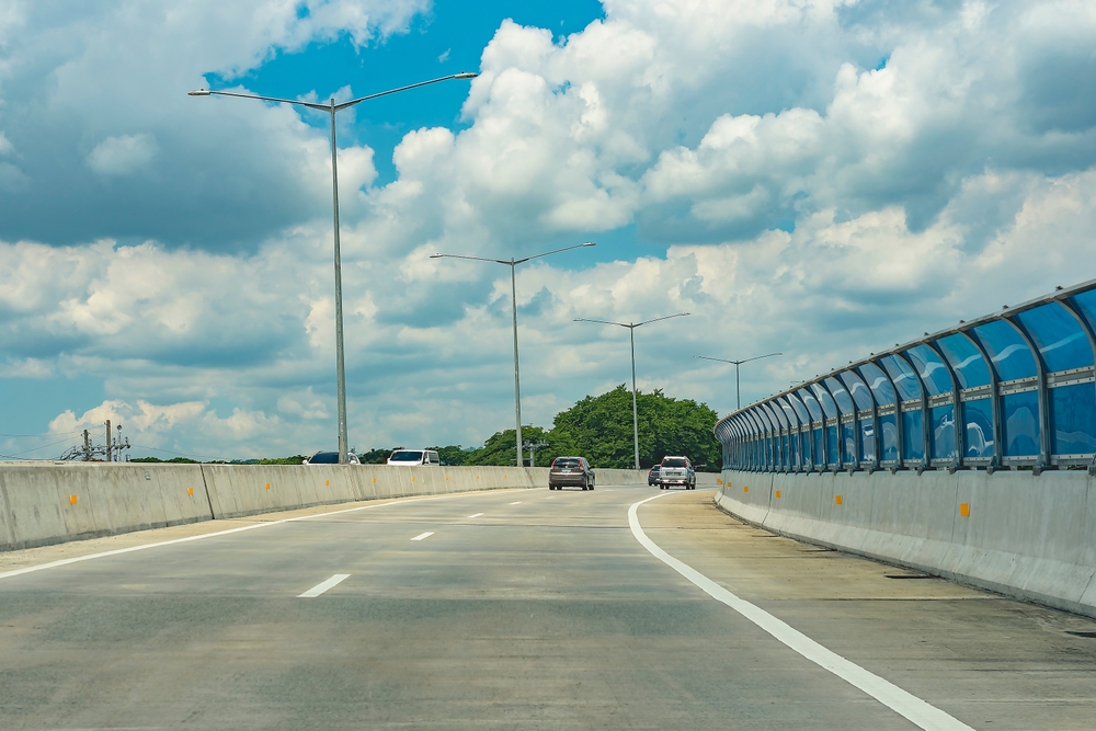 a public highway with cars 