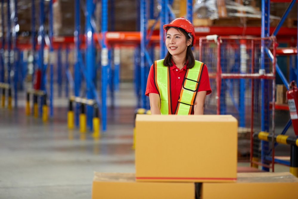a worker unloading boxes